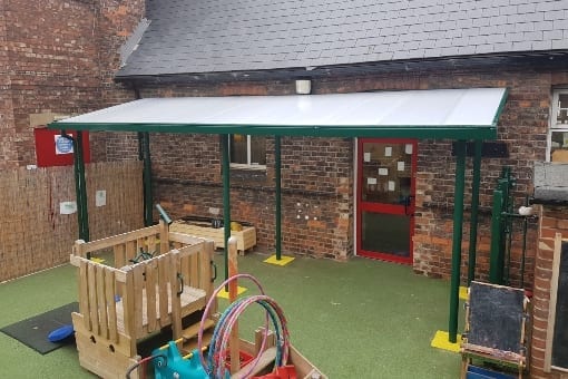 Straight roof green canopy we installed at The Hub Playgroup